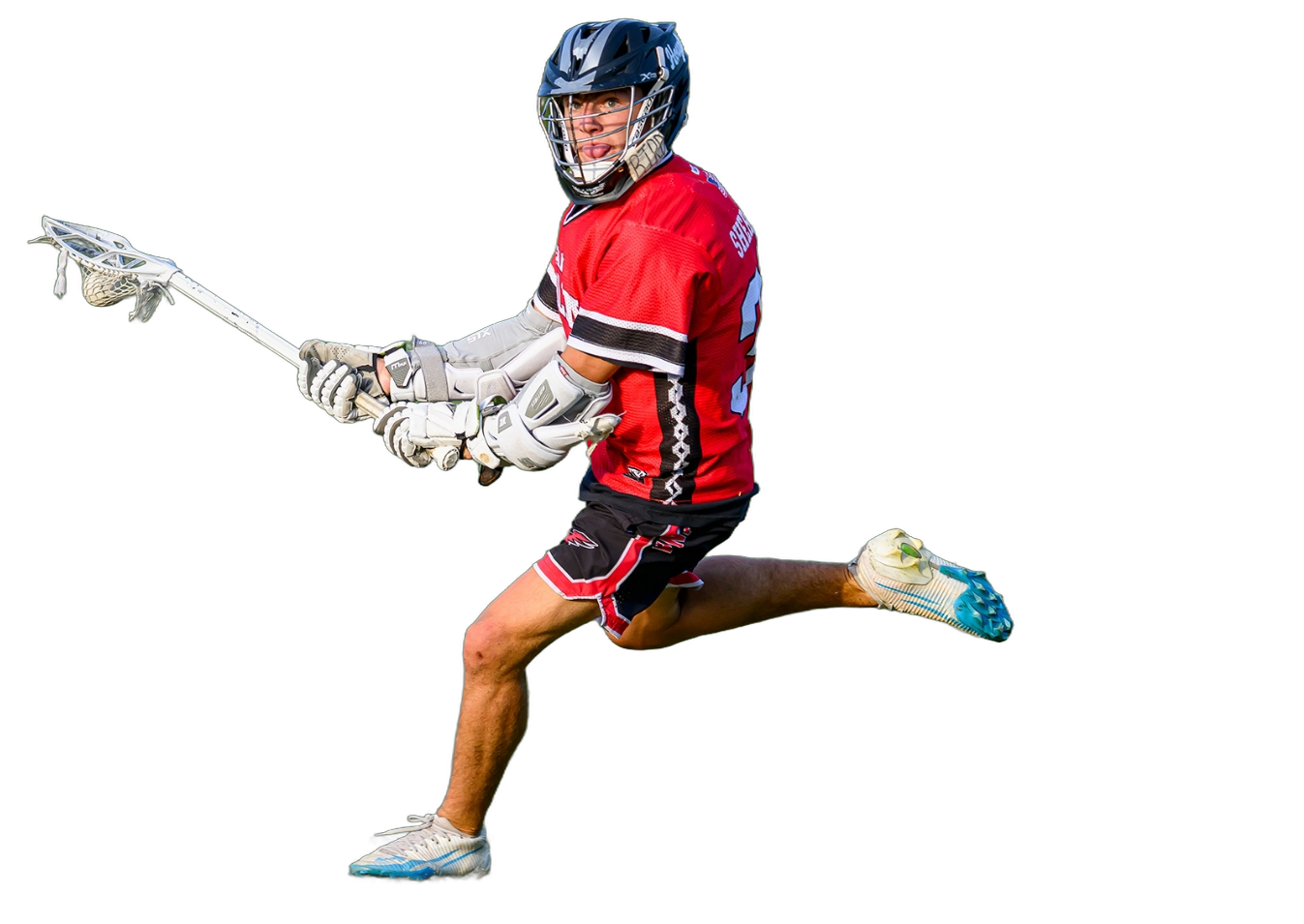 Team Carolina Elite boys travel lacrosse player driving downfield at a Charlotte tournament